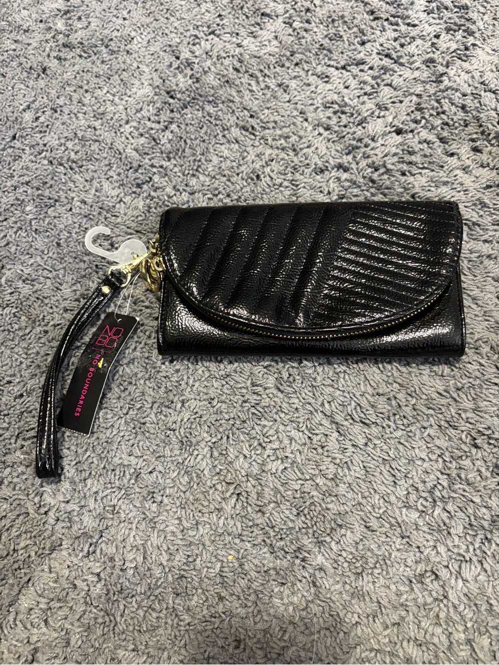 NWT No Boundaries Black Shiny wallet with card slots and a front zipper pocket